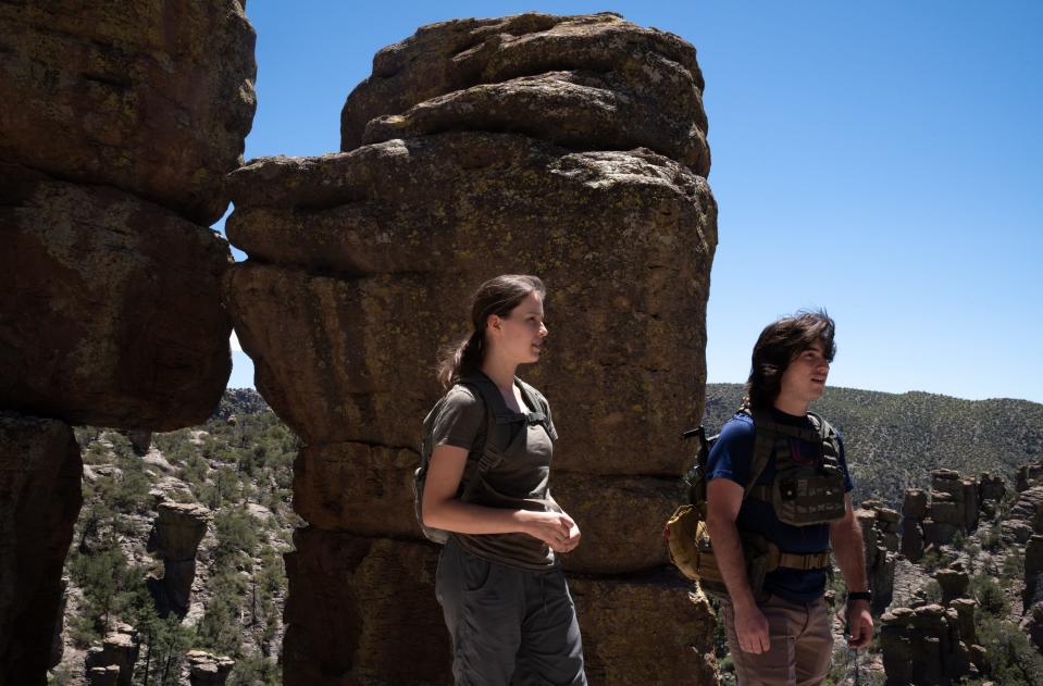 A portrait of hikers Dayton Van Acker (right) and Kathryn Bartlett (both of Mesa) on the Echo Canyon Trail, June 11, 2023, in the Chiricahua National Monument, located southeast of Willcox, Arizona.