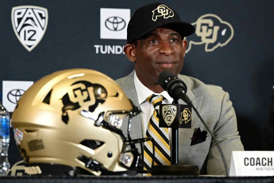 Helen H. Richardson/MediaNews Group/The Denver Post via Getty Deion Sanders, CUs new head football coach, takes questions from media