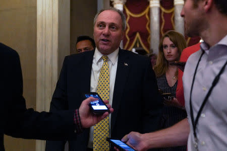 House Majority Whip Steve Scalise (R-LA) takes questions from reporters after leaving the House floor after a meeting regarding an immigration bill which was postponed in the U.S. Capitol in Washington, U.S., June 22, 2018. REUTERS/Toya Sarno Jordan