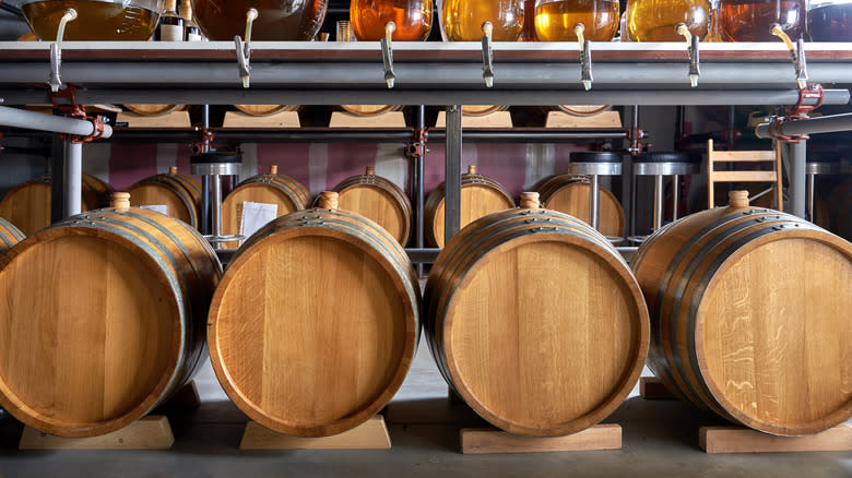 bourbon barrels in distillery