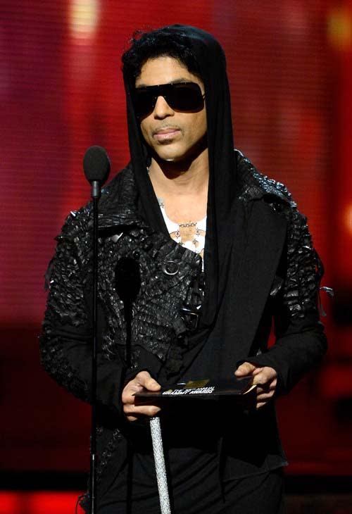 Prince stepped out at the Grammy awards looking fierce as ever. In a hooded black ensemble, he channeled his inner dark vaber.