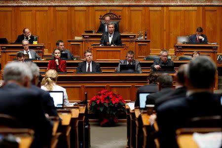 National Councilor Adrian Amstutz attends the debate on curbing the immigration, in the parliament, in Bern, Switzerland December 16, 2016. REUTERS/Ruben Sprich