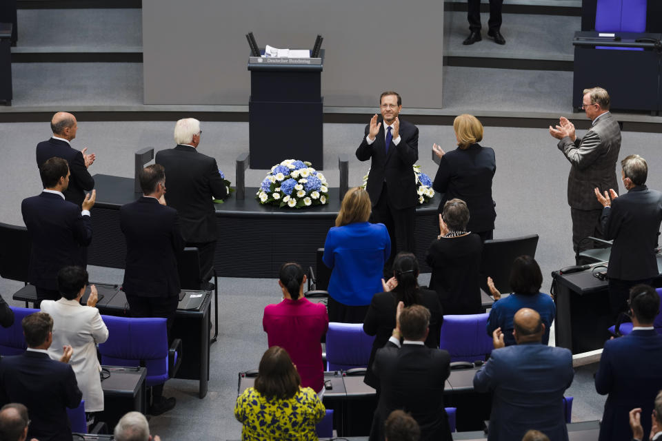 Israeli President Isaac Herzog receives standing ovations after his speech at the German parliament Bundestag at the Reichstag building in Berlin, Germany, Tuesday, Sept. 6, 2022. (AP Photo/Markus Schreiber)