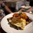 <b>The Reviewer:</b> Pete Wells, <em>The New York Times</em><br><b>Choice Cuts:</b> In the <a href="http://www.nytimes.com/2012/11/14/dining/reviews/restaurant-review-guys-american-kitchen-bar-in-times-square.html" rel="nofollow noopener" target="_blank" data-ylk="slk:2012 review heard round the world;elm:context_link;itc:0;sec:content-canvas" class="link ">2012 review heard round the world</a>, Wells talked trash about not only Fieri's restaurant but also the Food Network star himself. "Hey, did you try that blue drink, the one that glows like nuclear waste? …. Why did the toasted marshmallow taste like fish? … When you hung that sign by the entrance that says, WELCOME TO FLAVOR TOWN!, were you just messing with our heads?" And then things turned personal. "Why is one of the few things on your menu that can be eaten without fear or regret – a lunch-only sandwich of chopped soy-glazed pork with coleslaw and cucumbers – called a Roasted Pork Bahn Mi, when it resembles that item about as much as you resemble Emily Dickinson?" Ouch!<br><b>The Pièce de Résistance:</b> "Does this make it sound as if everything at Guy’s American Kitchen amp Bar is inedible? I didn't say that, did I?" Of course not!