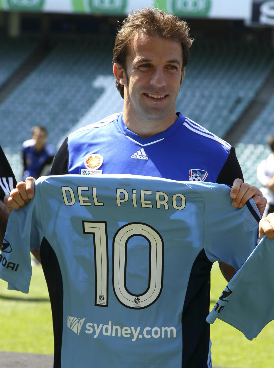 FILE - Former Juventus soccer star Alessandro Del Piero holds his newly acquired shirt during a training session with his new club Sydney FC in Sydney, on Sept. 23, 2012. Cristiano Ronaldo is not the first soccer superstar to head off to one of the world’s supposed minor leagues in the latter years of his career. Del Piero, the majestic Italy World Cup-winning forward, is comfortably the biggest name to have played in Australian soccer after his two years with Sydney FC (2012-14) on what was described by the club as the “largest professional sporting contract in Australian history” -- a reported $2 million a season.(AP Photo/Rick Rycroft, File)