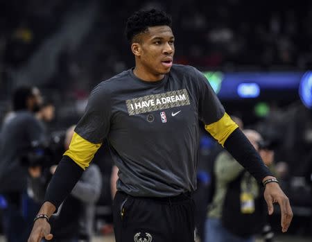 FILE PHOTO: Jan 21, 2019; Milwaukee, WI, USA; Milwaukee Bucks forward Giannis Antetokounmpo (34) warms up before game against the Dallas Mavericks at the Fiserv Forum. Mandatory Credit: Benny Sieu-USA TODAY Sports