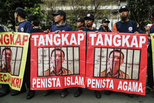 <span class="caption">Demonstrators demanding that Jakarta's Christian governor, Basuki Tjahaja Purnama, should be jailed for blasphemy.</span> <span class="attribution"><span class="source">EPA/Mast Irham</span></span>