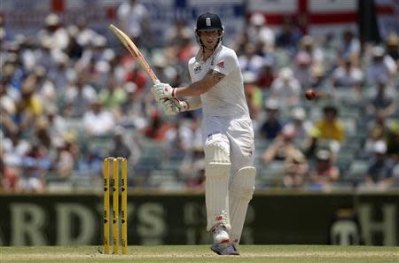 England's Ben Stokes hits out during the fifth and final day of the third Ashes test cricket match against Australia at the WACA ground in Perth December 17, 2013. REUTERS/Philip Brown