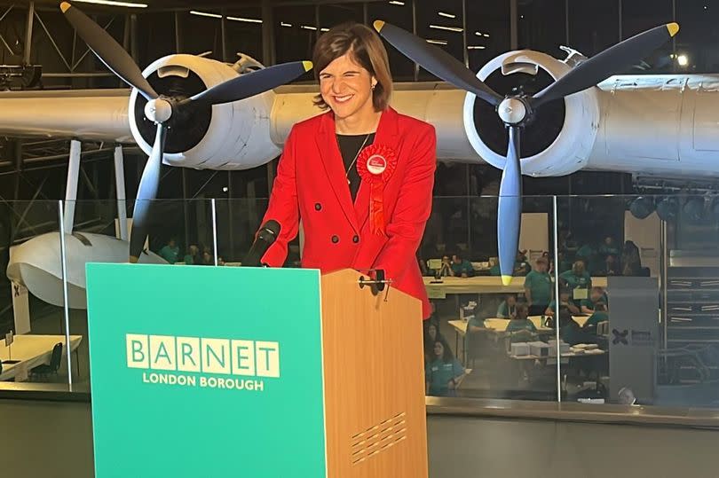 Sarah Sackman at lectern after winning