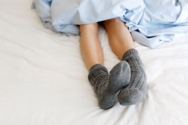 Scientists say wearing socks to bed is like 'sleeping in a toilet