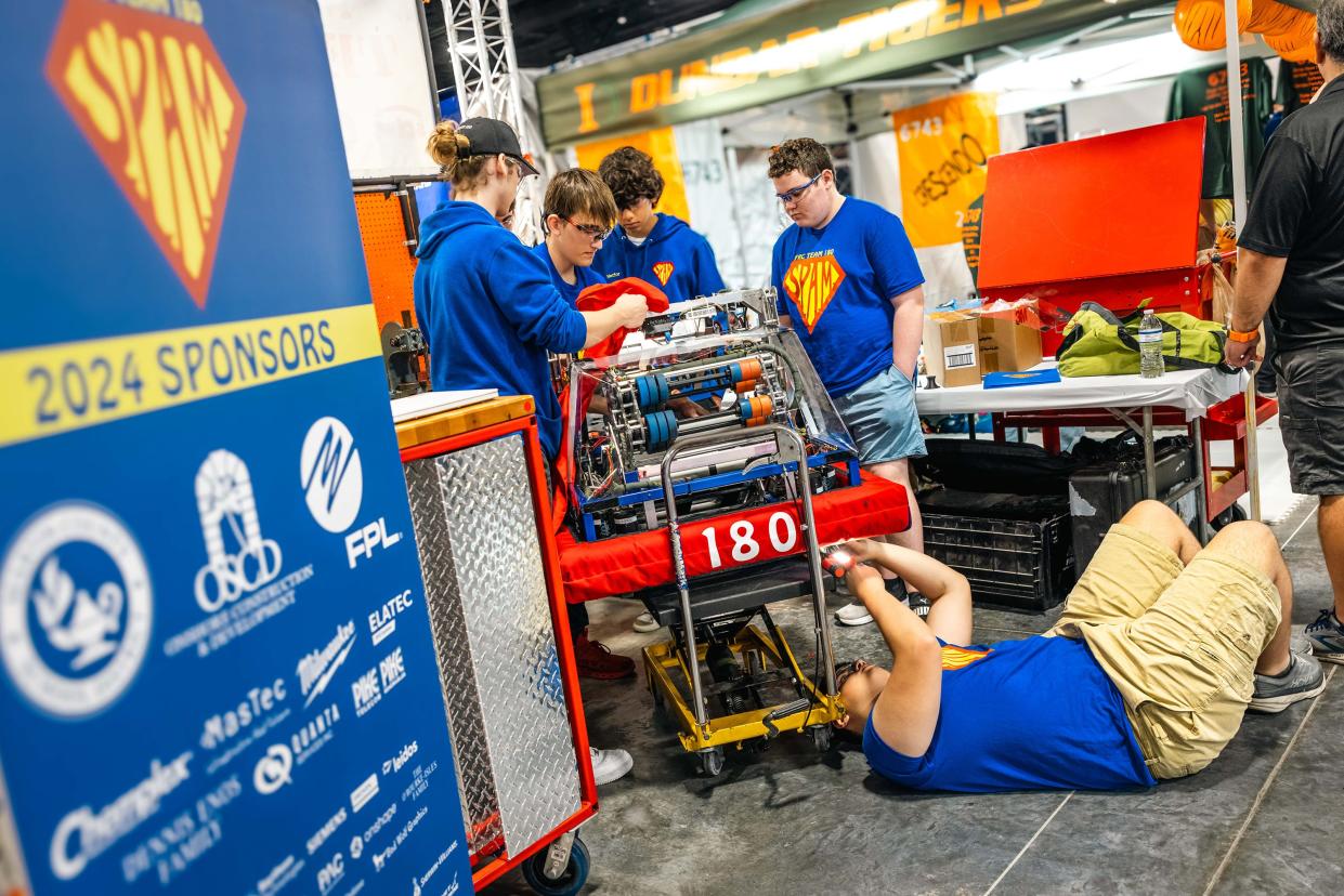 Stuart’s high school robotics team S.P.A.M. putting the final touches on their robot. They won the last two Florida regionals and are hoping to win the upcoming championship in Texas.