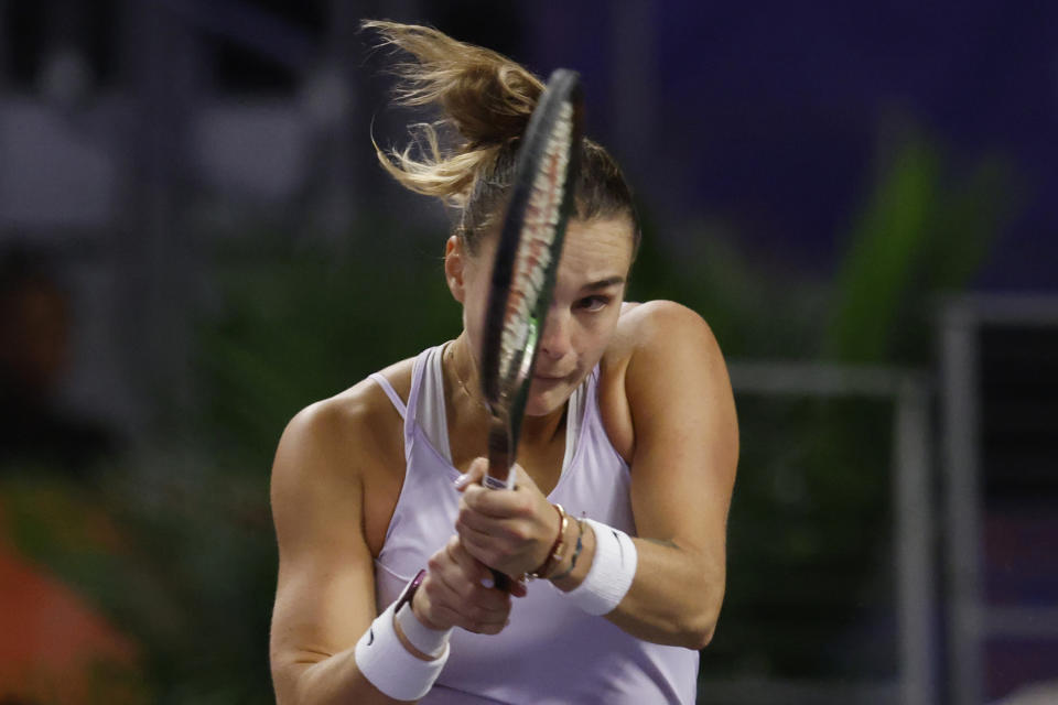 Aryna Sabalenka, of Belarus, hits against Caroline Garcia, of France, in the singles final of the WTA Finals tennis tournament in Fort Worth, Texas, Monday, Nov. 7, 2022. (AP Photo/Ron Jenkins)