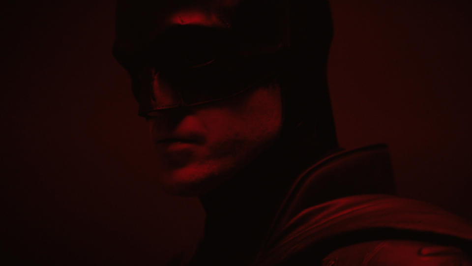 Robert Pattinson wearing the cowl as Batman.