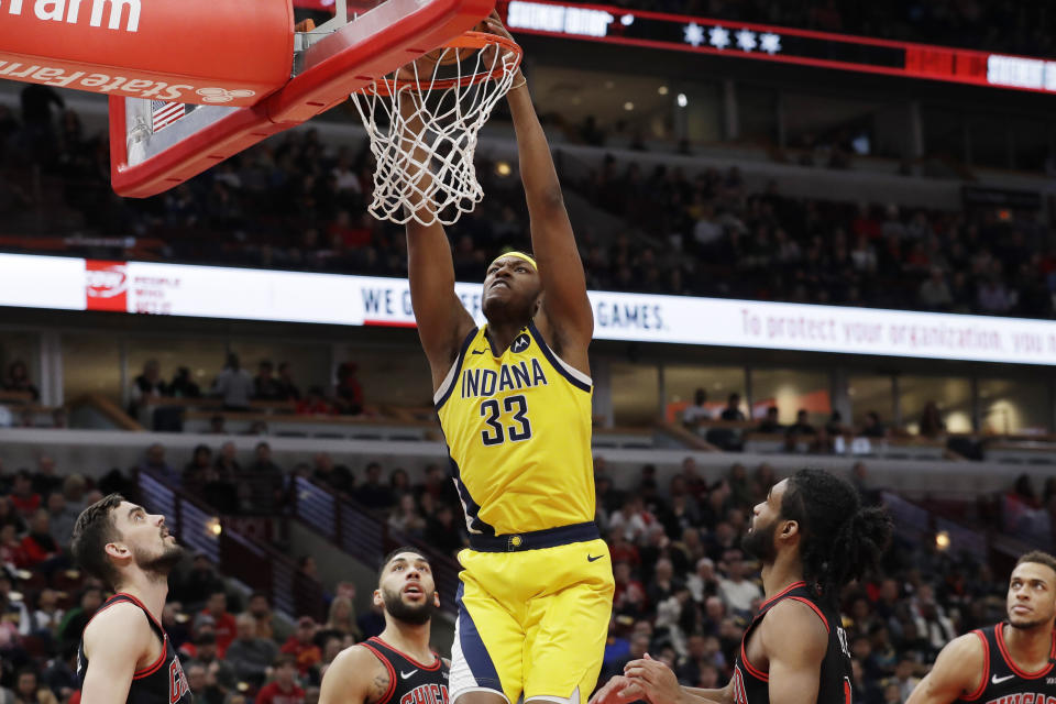 Indiana Pacers' Myles Turner (33) dunks against the Chicago Bulls during the first half of an NBA basketball game in Chicago, Friday, March 6, 2020. (AP Photo/Nam Y. Huh)