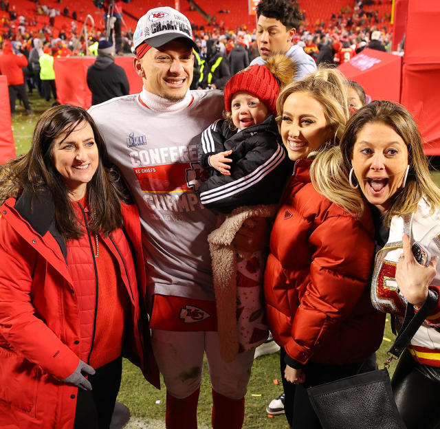 Patrick Mahomes Embraces Family in Kansas City Chiefs Jersey & Cleats –  Footwear News