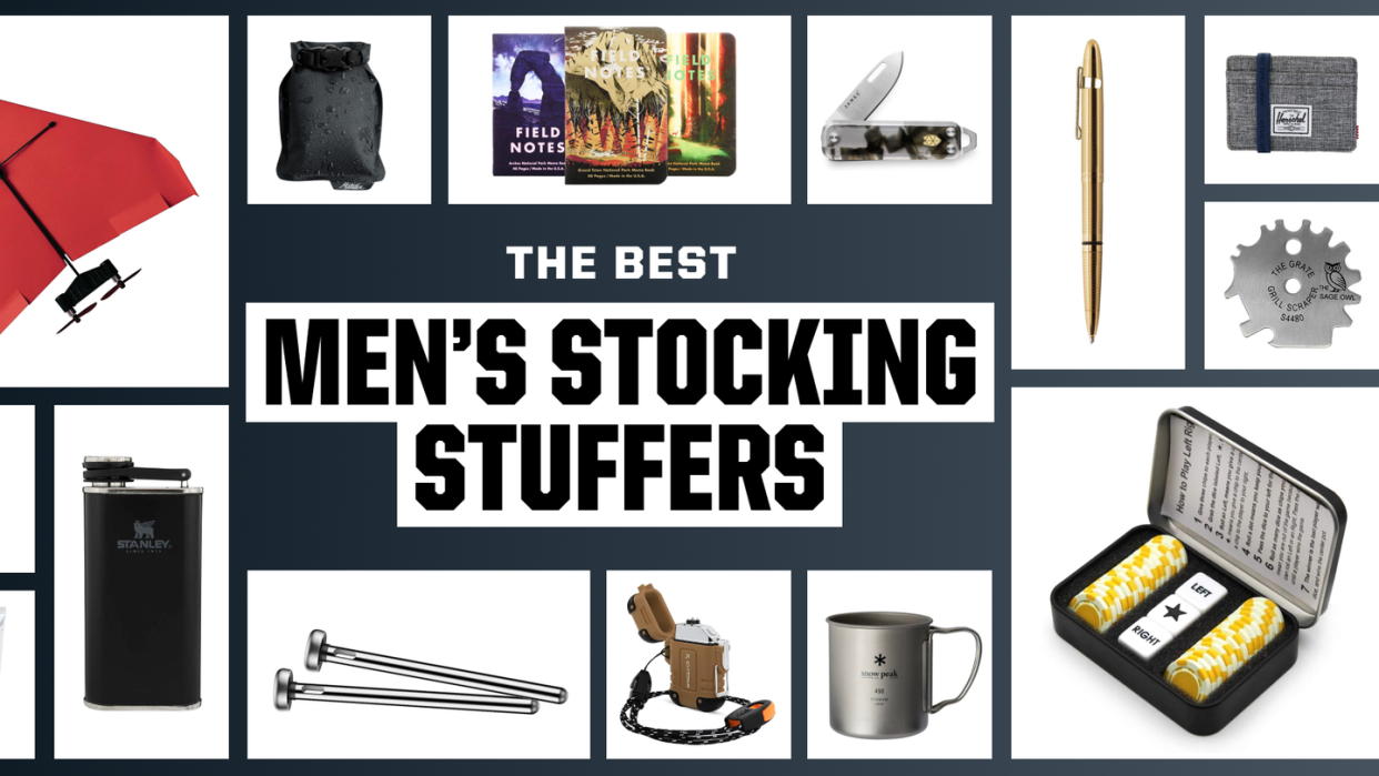 the best men's stocking stuffers, paper airplane, soap bag, field notes, pocket knife, pen, wallet, grill scraper, game, mug, lighter, beer chiller, flask, clip light, toothpaste