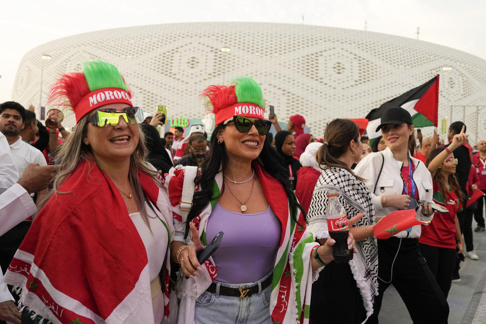 FILE - Female Morocco fans arrive at the stadium before the World Cup quarterfinal soccer match between Morocco and Portugal, at Al Thumama Stadium in Doha, Qatar, Saturday, Dec. 10, 2022. (AP Photo/Ebrahim Noroozi, File)