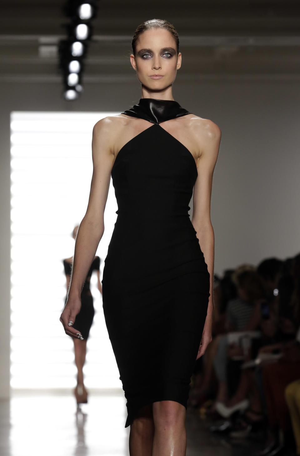 The Cushnie et Ochs Spring 2014 collection is modeled during Fashion Week in New York, Friday, Sept. 6, 2013. (AP Photo/Richard Drew)