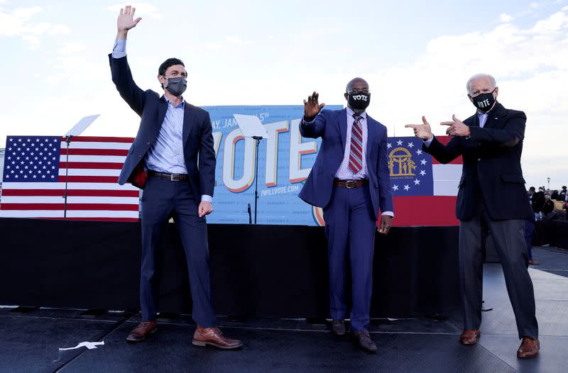 FILE PHOTO: U.S. President-elect Joe Biden campaigns for Democratic U.S. Senate candidates Ossoff and Warnock in Atlanta, Georgia