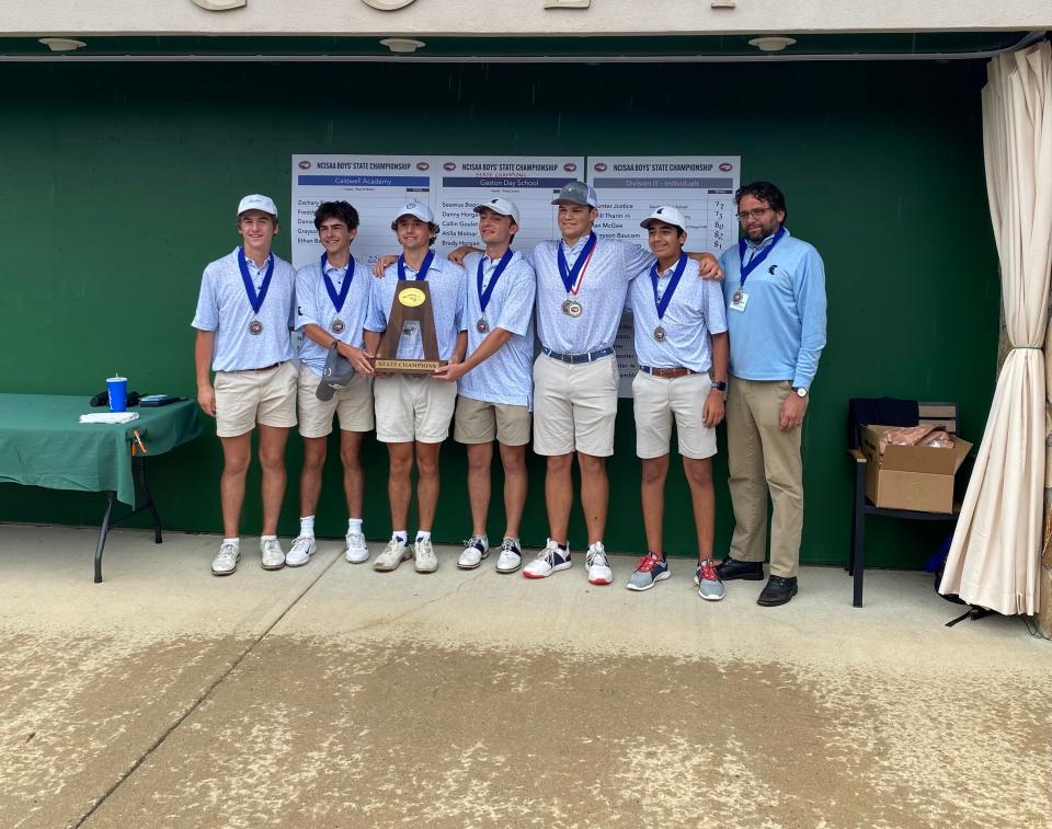 The Gaston Day boys golf celebrates its 2023 NCISAA Division III state title.