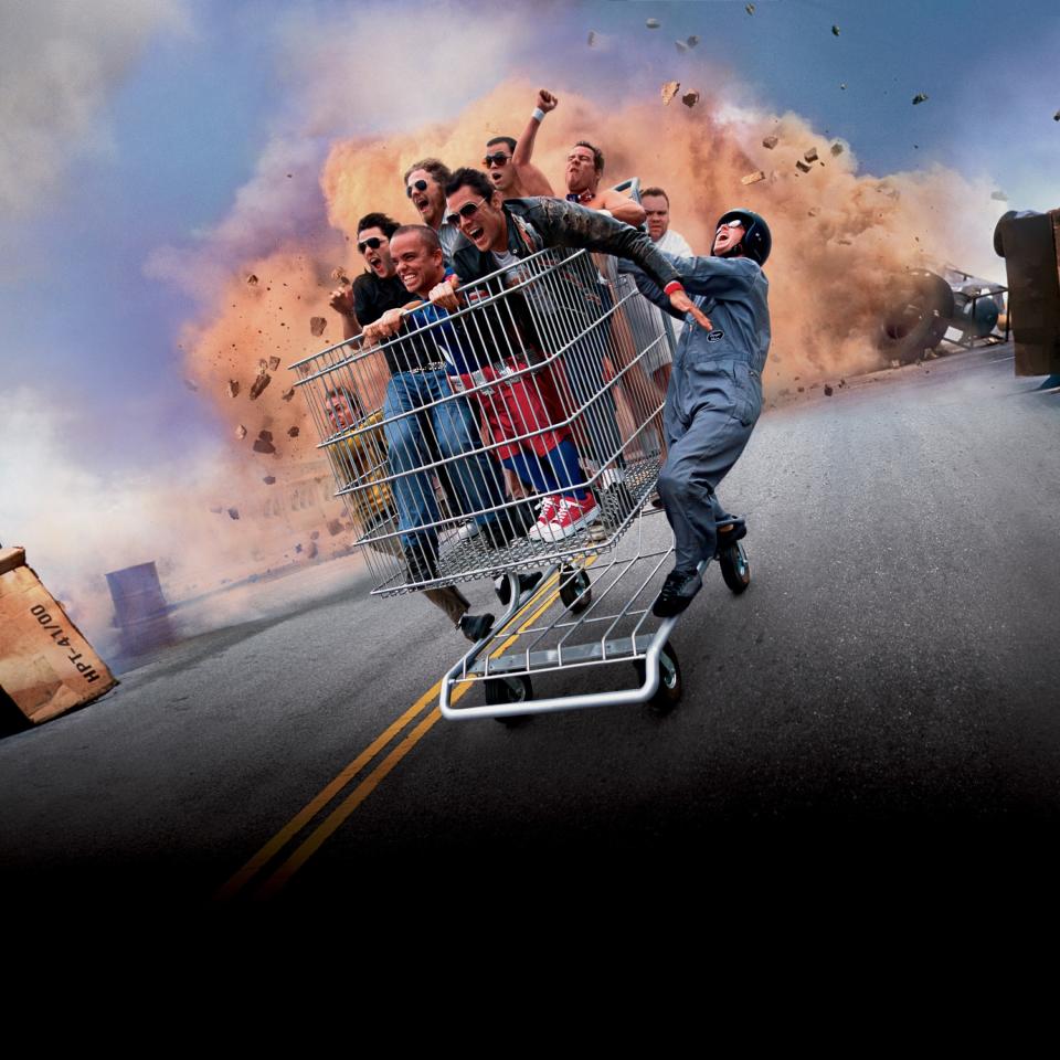 The Jackass crew riding in a shopping cart