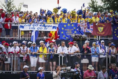 Aug 18, 2017; West Des Moines, IA, USA; Fans of Team Europe and Team USA pack the stands around the first tee box before the Solheim Cup foursome matches at the Des Moines Golf and Country Club. Mandatory Credit: Rodney White/The Des Moines Register via USA TODAY NETWORK