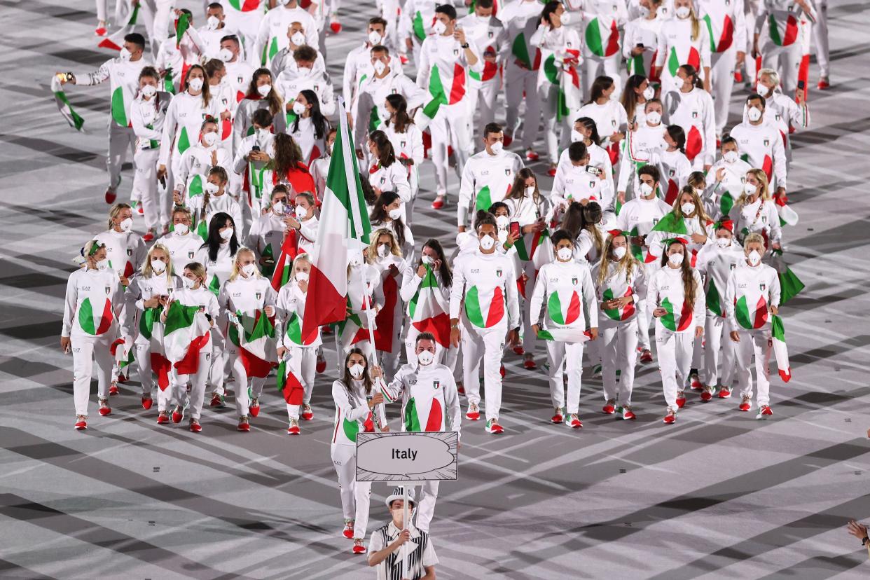 Flag bearers Jessica Rossi and Elia Viviani of Team Italy