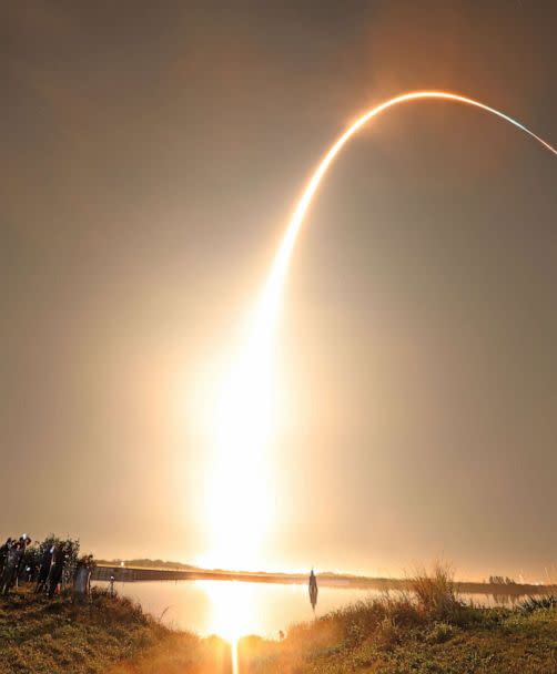 PHOTO: A time exposure shows the path of the Artemis I unmanned lunar rocket as it lifts off from launch pad 39B at NASA's Kennedy Space Center in Cape Canaveral, Florida, on Nov. 16, 2022. (Gregg Newton/AFP via Getty Images)