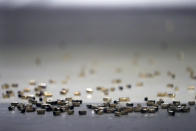 Bullet casings lie on the floor at the shooting range of Maxon Shooter's Supplies and Indoor Range, Friday, April 30, 2021, in Des Plaines, Ill. After a year of pandemic lockdowns, mass shootings are back, but the guns never went away. As the U.S. inches toward a post-pandemic future, guns are arguably more present in the American psyche and more deeply embedded in American discourse than ever before. The past year's anxiety and loss fueled a rise in gun ownership across political and socio-economic lines. (AP Photo/Shafkat Anowar)