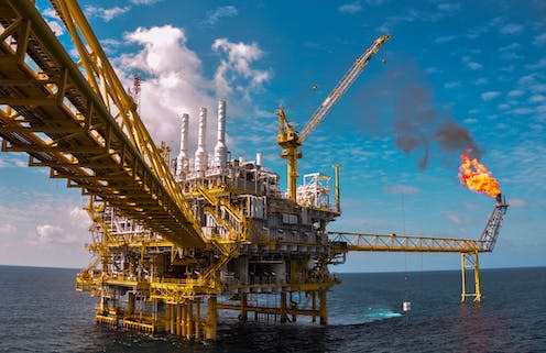 <span class="caption">Fossil fuel investors can use an obscure legal mechanism found in many international trade agreements to sue countries if their projects are blocked. </span> <span class="attribution"><a class="link " href="https://www.shutterstock.com/image-photo/oil-gas-platform-burning-power-energy-164604329" rel="nofollow noopener" target="_blank" data-ylk="slk:curraheeshutter via Shutterstock;elm:context_link;itc:0;sec:content-canvas">curraheeshutter via Shutterstock</a></span>