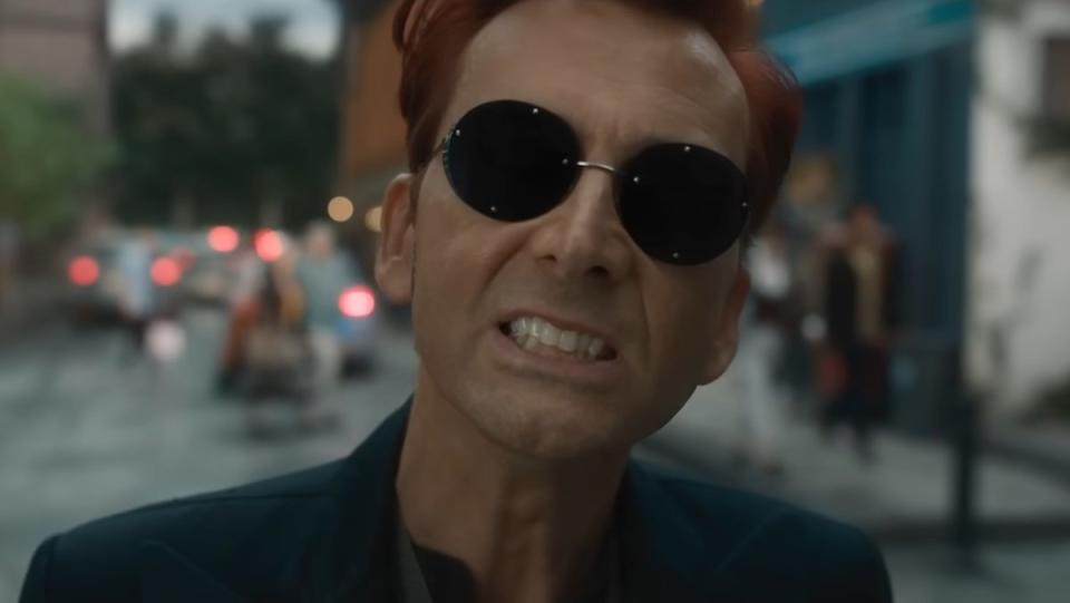 Crowley in sunglasses sneering on Good Omens