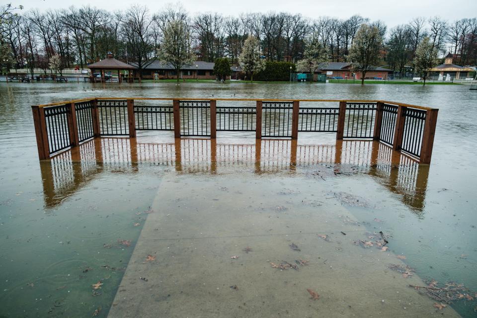 The Tuscora Park Pond in New Philadelphia is seen flooded after intense rain storms overnight, Tuesday, April 2.