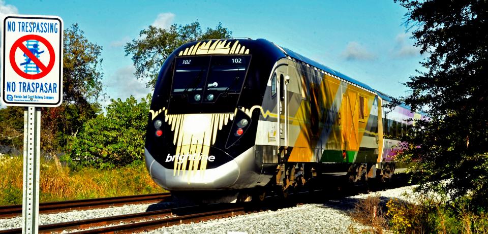 A Brightline train departs the Dixon Boulevard crossing Wednesday morning in Cocoa during the early hours of an up-to-79 mph testing period across the Cocoa-Rockledge area.
