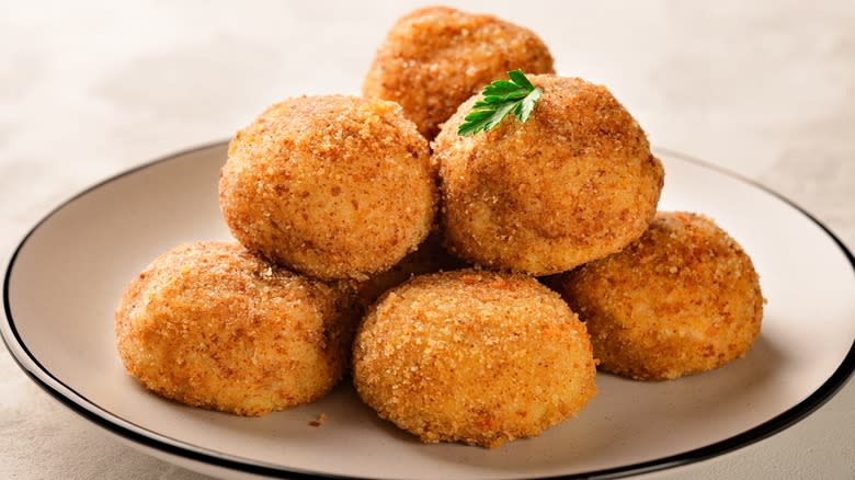 potato croquettes on plate