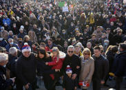 Serbia's Novak Djokovic's father Srdjan, front center, mother Dijana, second right, and brother Djordje, right, pose after protest in Belgrade, Serbia, Friday, Jan. 7, 2022. Several hundred people gathered outside Serbian parliament in a show of support for Serbian player Novak Djokovic as he battles the Australian legal system in an attempt to be allowed to stay in the country and compete in the Australian Open later this month. (AP Photo/Darko Vojinovic)