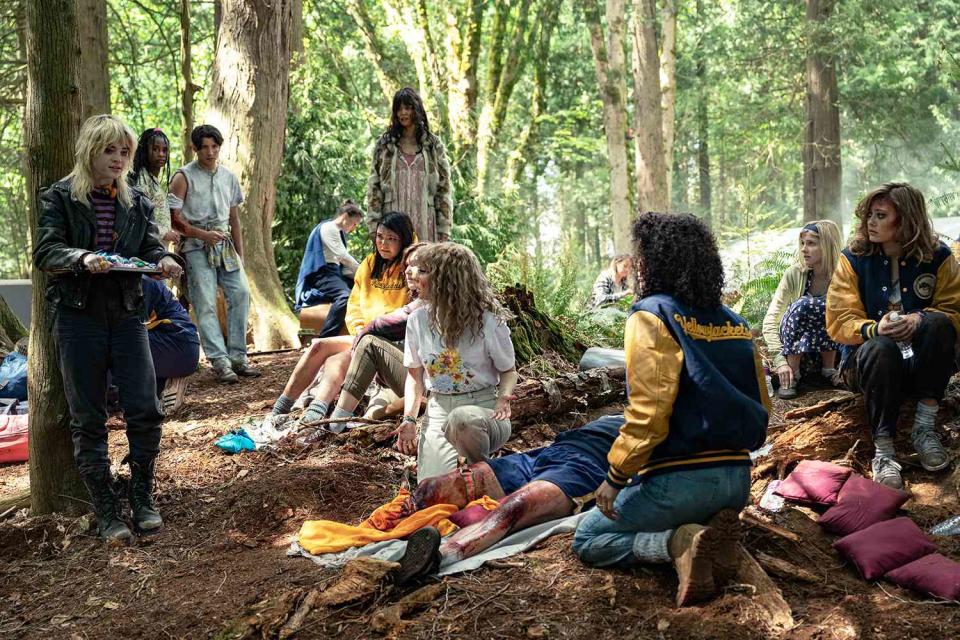 (L-R): Sophie Thatcher as Teen Natalie, Keeya King as Teen Akilah, Kevin Alves as Teen Travis, Courtney Eaton as Teen Lottie, Alexa Barajas Plante as Teen Mari, Sophie Nélisse as Teen Shauna, Samantha Hanratty as Teen Misty, Jasmin Savoy Brown as Teen Taissa, Jane Widdop as Teen Laura Lee and Ella Purnell as Teen Jackie in YELLOWJACKETS, “F Sharp”.