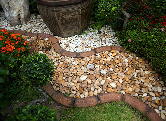 <body> <p>If you're interested in more landscaping ideas, consider:</p> <p><a rel="nofollow noopener" href=" http://www.bobvila.com/wine-bottle-edging/44302-on-the-edge-16-garden-borders-you-can-make/slideshows#.VD2IyPldWSo?bv=yahoo" target="_blank" data-ylk="slk:On the Edge: 16 Garden Borders You Can Make;elm:context_link;itc:0;sec:content-canvas" class="link ">On the Edge: 16 Garden Borders You Can Make </a> </p> <p><a rel="nofollow noopener" href=" http://www.bobvila.com/landscaping-focal-point/47571-12-expert-tips-for-eye-catching-front-yard-landscaping/slideshows#.VD2I2vldWSo?bv=yahoo" target="_blank" data-ylk="slk:12 Expert Tips for Eye-Catching Front Yard Landscaping;elm:context_link;itc:0;sec:content-canvas" class="link ">12 Expert Tips for Eye-Catching Front Yard Landscaping</a> </p> <p><a rel="nofollow noopener" href=" http://www.bobvila.com/tiered-backyard/47534-1-dozen-ways-to-make-the-most-of-a-small-yard/slideshows?bv=yahoo" target="_blank" data-ylk="slk:1 Dozen Ways to Make the Most of a Small Backyard;elm:context_link;itc:0;sec:content-canvas" class="link ">1 Dozen Ways to Make the Most of a Small Backyard</a> </p> </body>
