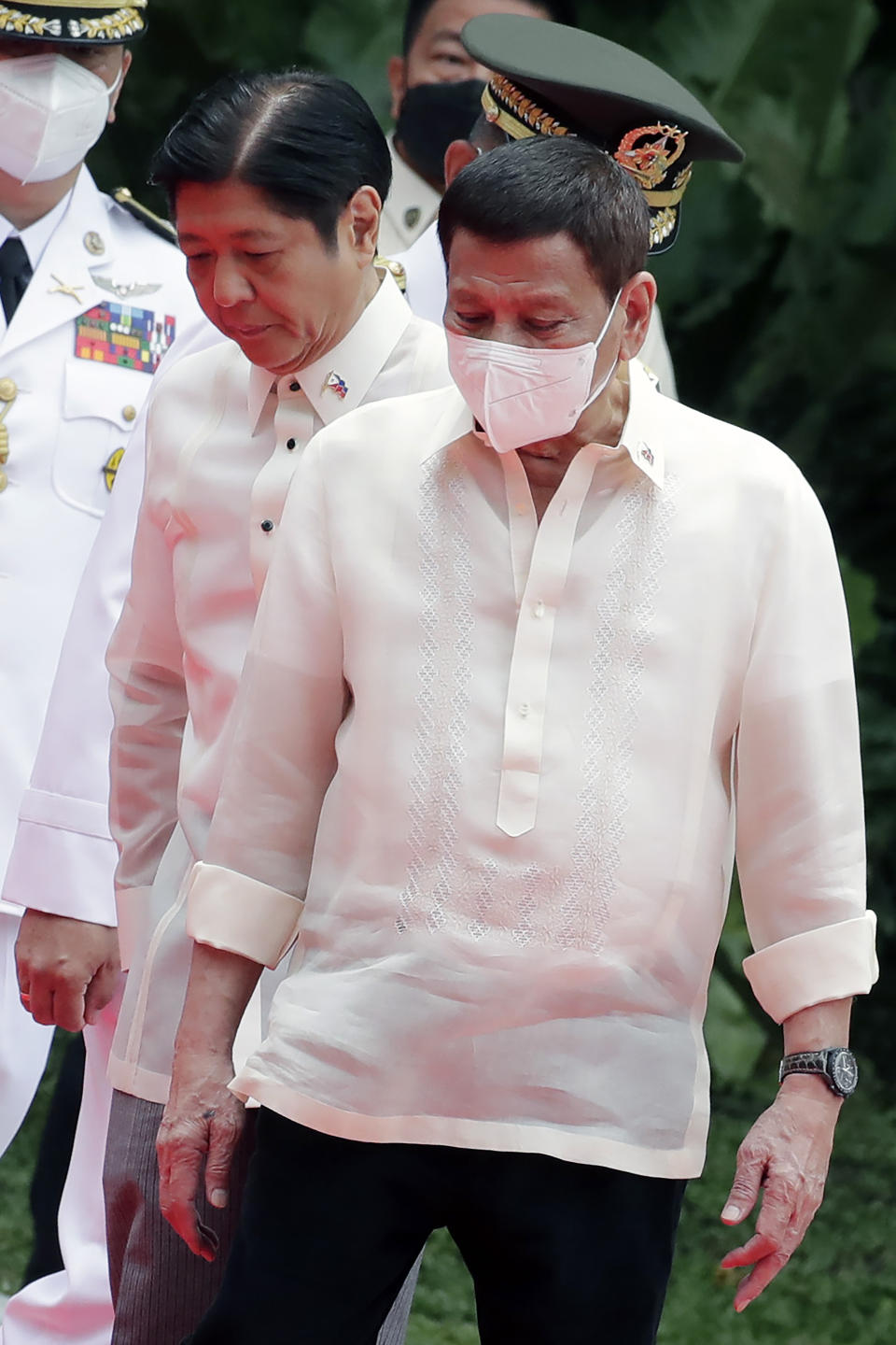 Incoming Philippine President Ferdinand Marcos Jr., left, and outgoing President Rodrigo Duterte, right, attend Marcos' inauguration ceremony at the Malacanang presidential palace grounds in Manila, Philippines, on June 30, 2022.<span class="copyright">Francis R. Malasig—AP</span>