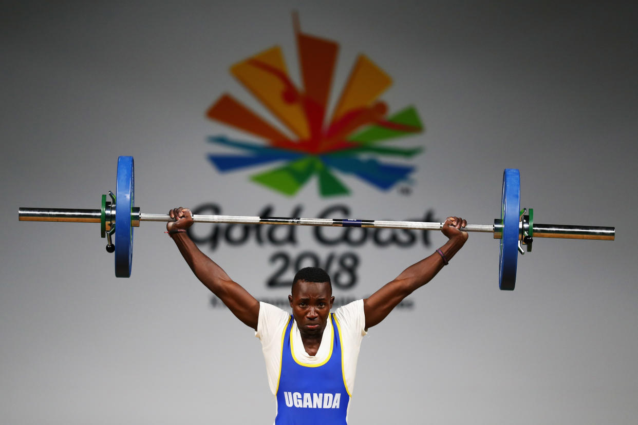 GOLD COAST, AUSTRALIA - APRIL 05:  Julius Ssekitoleko of Uganda competes during the Weightlifting Men's 56kg Final on day one of the Gold Coast 2018 Commonwealth Games at Carrara Sports and Leisure Centre on April 5, 2018 on the Gold Coast, Australia.  (Photo by Dean Mouhtaropoulos/Getty Images)