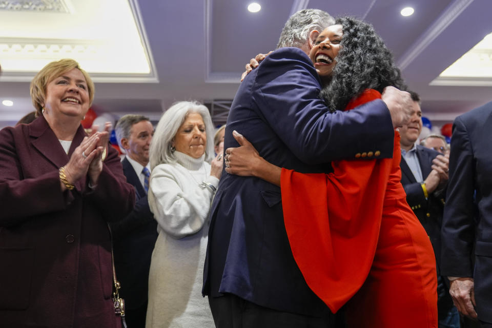 Republican candidate for New York's 3rd congressional district Mazi Pilip, right, hugs former congressman Peter King after speaking to supporters during an election night party, Tuesday, Feb. 13, 2024, in East Meadow, N.Y. (AP Photo/Mary Altaffer)