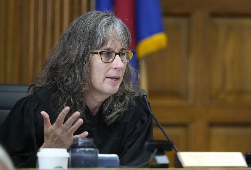 Judge Sarah B. Wallace presides over a hearing for a lawsuit that seeks to keep former President Donald Trump off the state ballot, in court in Denver on Monday, Oct. 30, 2023. (AP Photo/Jack Dempsey, Pool)