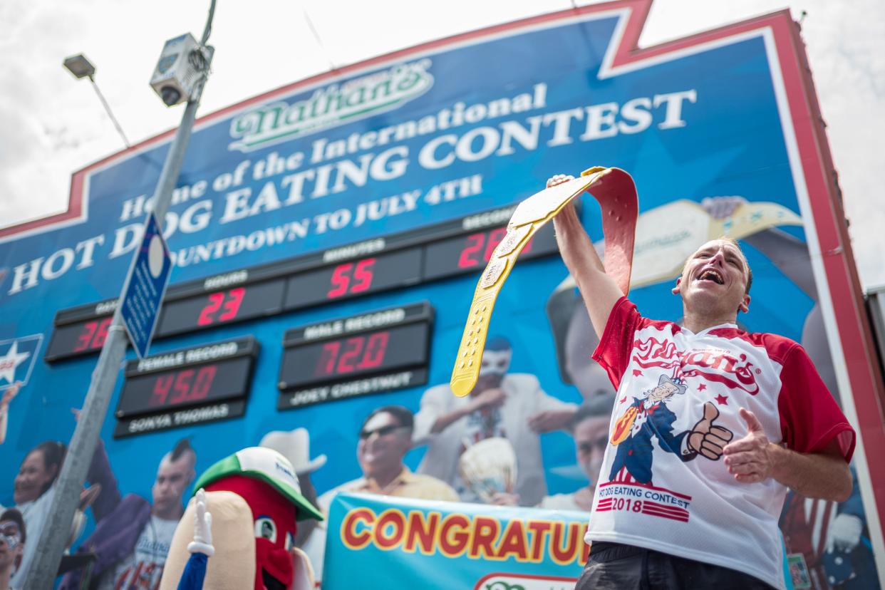 Joey Chestnut wins the 2018 Nathan's Hot Dog Eating Contest and sets a new record by eating 74 hot dogs in 10 minutes