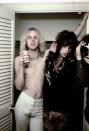 <p>Aerosmith's Steven Tyler and Tom Hamilton pose backstage while in Newport, Rhode Island. </p>