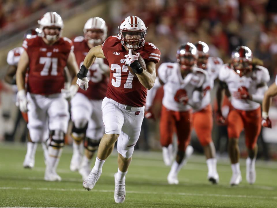 FILE - In this Aug. 31, 2018, file photo, Wisconsin running back Garrett Groshek (37) heads to the end zone with a 42-yard touchdown against Western Kentucky during the second half of an NCAA college football game in Madison, Wis. Groshek ran for 194 yards on 42 carries and caught 29 passes for 289 yards last season. (AP Photo/Andy Manis, File)