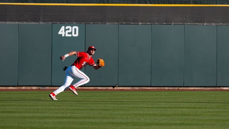 Utah Utes outfielder Kai Roberts (24) runs for the ball during a college baseball game between the Utah Utes and the Brigham Young Cougars at Smith's Ballpark in Salt Lake City on Tuesday, April 9, 2024.