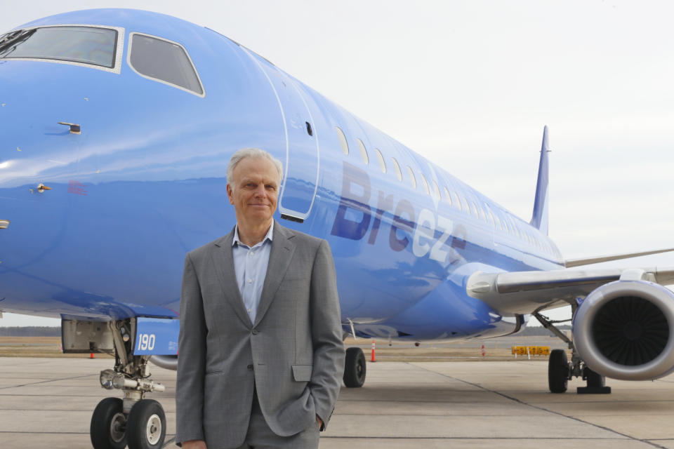 This photo provided by CeanOrrett shows David Neeleman with Breeze aircraft. Two new U.S. airlines are planning on starting service this spring, tapping into the travel recovery that is picking up speed. Breeze Airways is next up, the latest creation of David Neeleman, who founded JetBlue Airways more than 20 years ago. (CeanOrrett via AP)