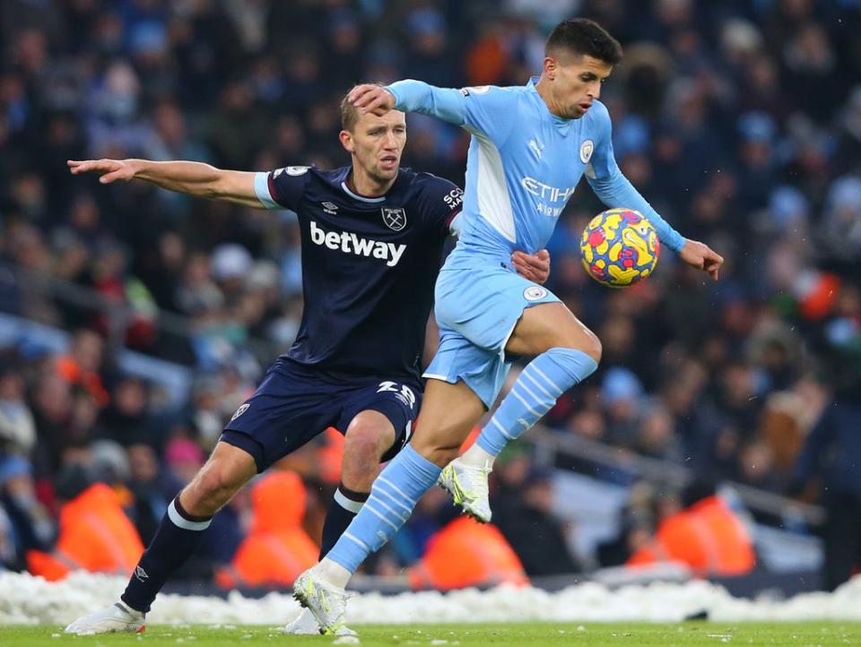 Joao Cancelo skips past West Ham’s Tomas Soucek (Getty)