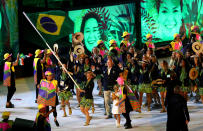 <p>The Parade of Nations was long, but the home team’s entrance at the end, behind Flag bearer Yane Marques, woke us right up. (Photo by Dean Mouhtaropoulos/Getty Images) </p>