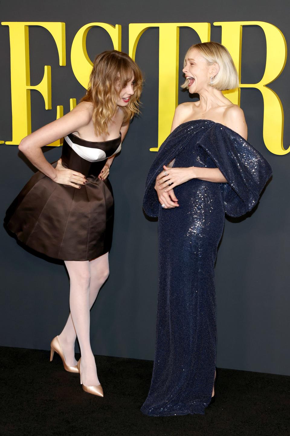 Maya Hawke in a brown dress and Carey Mulligan in a blue dress at Netflix's "Maestro" LA special screening