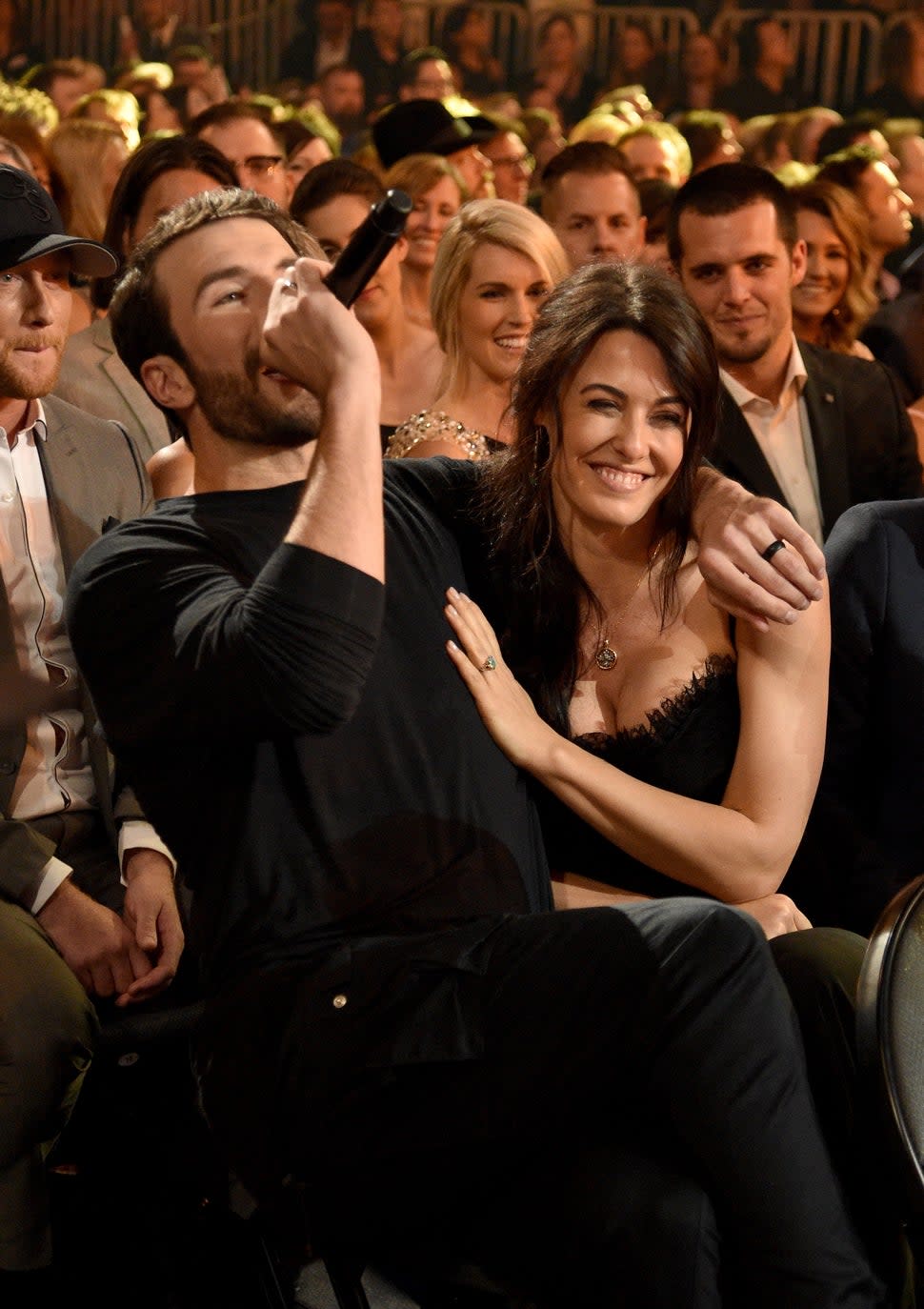 Hannah Lee Fowler (R) reacts as recording artist Sam Hunt (L) performs during the 52nd Academy Of Country Music Awards at T-Mobile Arena on April 2, 2017 in Las Vegas, Nevada.